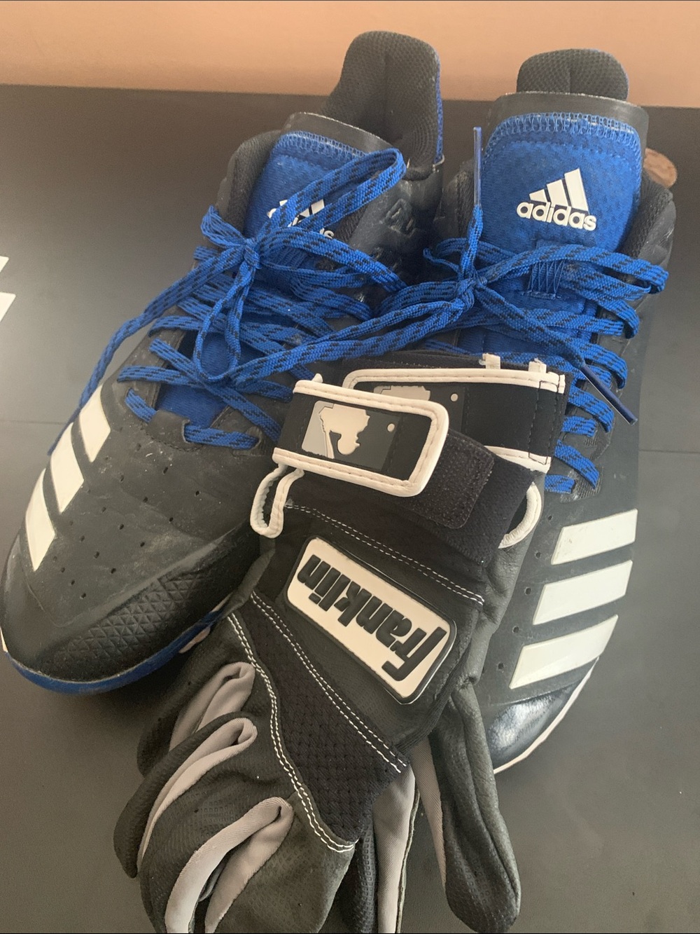 USED adidas Black and Blue Cleats with used small adult Franklin batting gloves